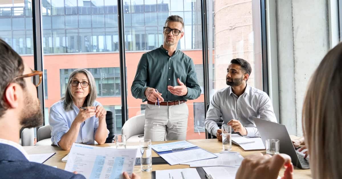 A group of business people at a meeting.