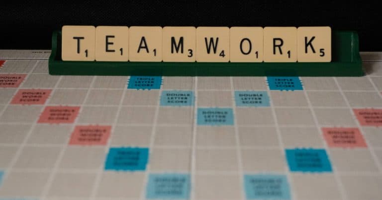 Scrabble letters spelling the word Teamwork.